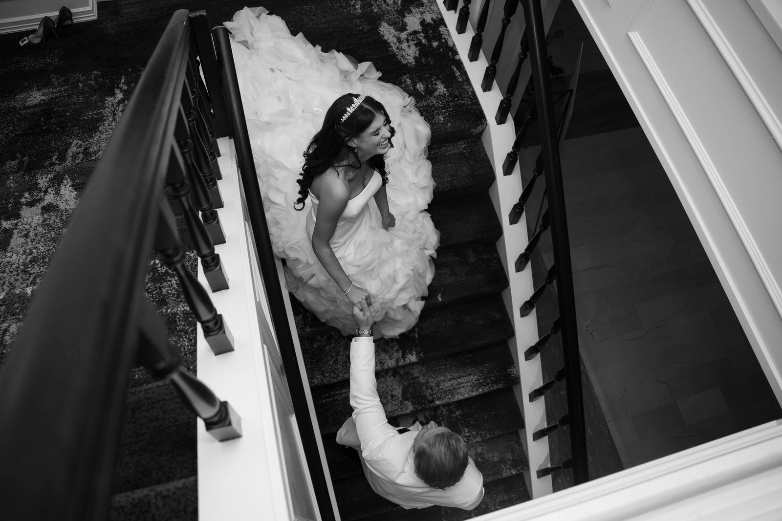Bride and groom on the hotel's historic staircase